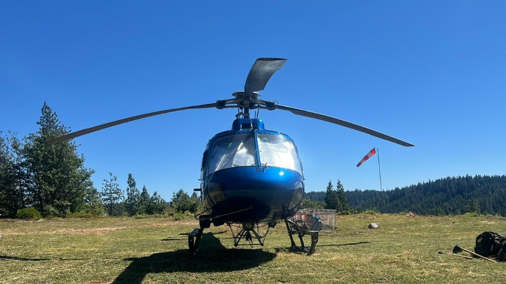 Mountain Air AS350 helicopter facing forward